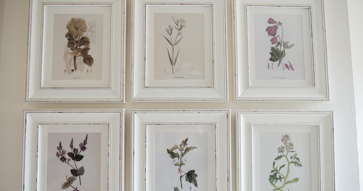A handmade cottage Botanical print feature wall & how to hang pictures