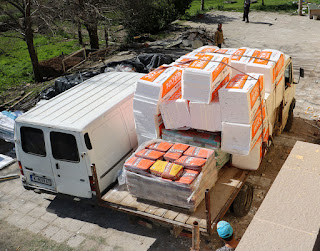 Two vans arrive at once Two vans arrive at once