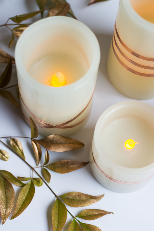 Wrap flameless LED candles with copper foil tape for a gorgeous look - perfect for fall or your Thanksgiving table! Wrap flameless LED candles with copper foil tape for a gorgeous look - perfect for fall or your Thanksgiving table!