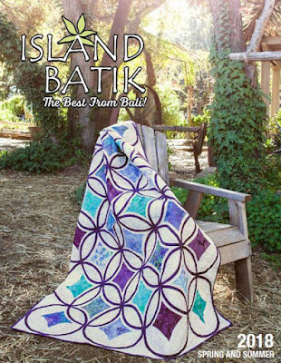 Moonrise quilt on the cover of the spring 2018 Island Batik catalog