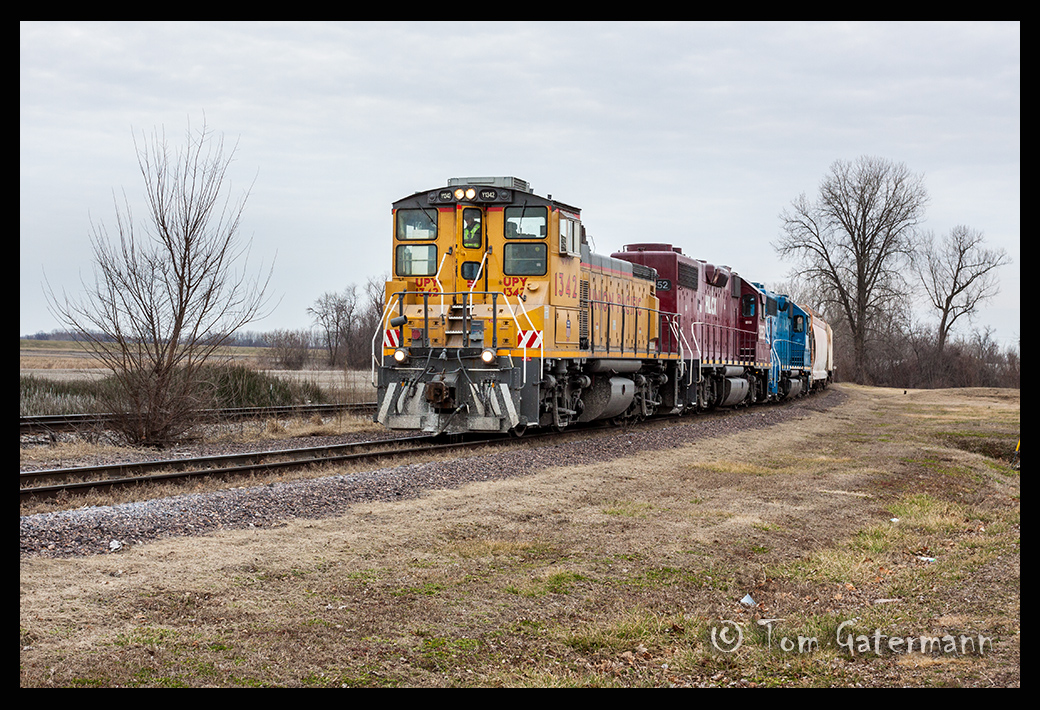 UPY 1342 at Ste. Genevieve With A Train Of Cars From The Mississippi