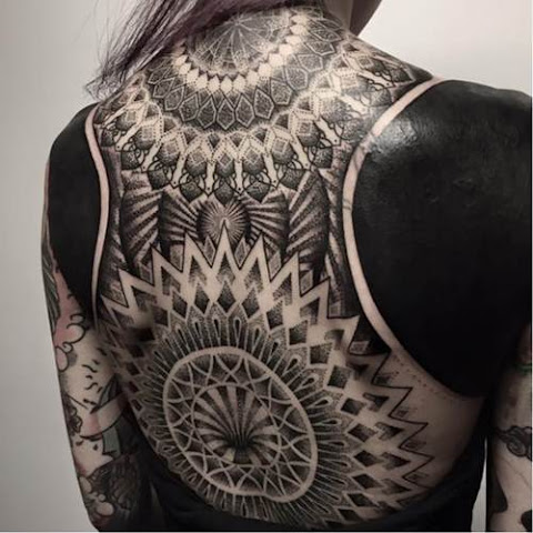 18 Outstanding Ornamental Blackwork Tattoos