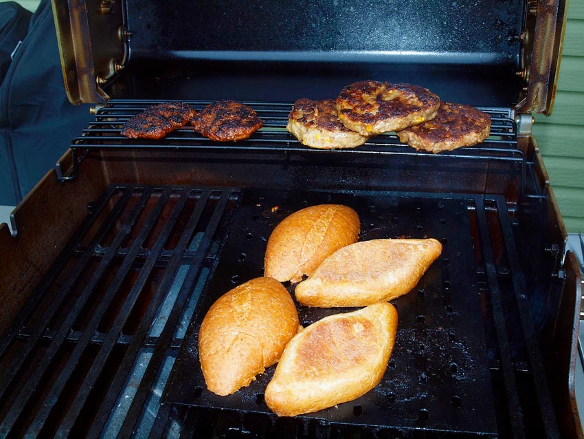 Pellet Smoker Cooking Brat and Chorizo Patties w/Corn on the Cob