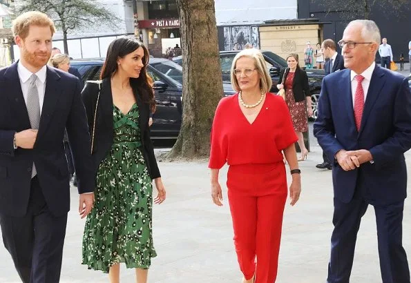 Meghan Markle wore Self-Portrait Cold shoulder floral printed dress and Alexander McQueen blazer. Prime Minister Malcolm Turnbull and Lucy