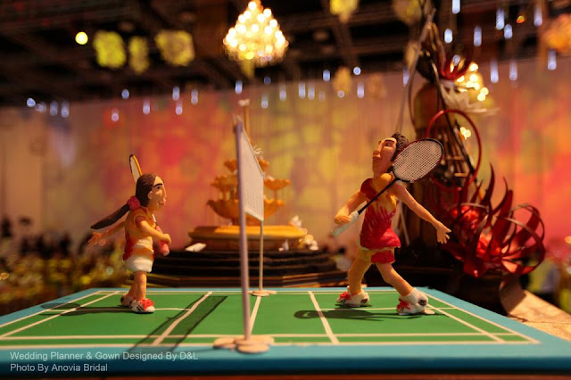 Badminton brought Chong Wei and Mew Choo together. They had figurines of two of them playing the game as the cake topper.