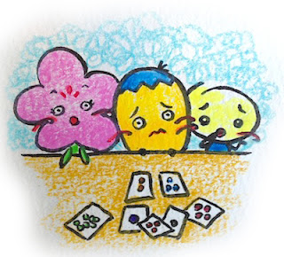 the three friends are looking at the cards, unhappy