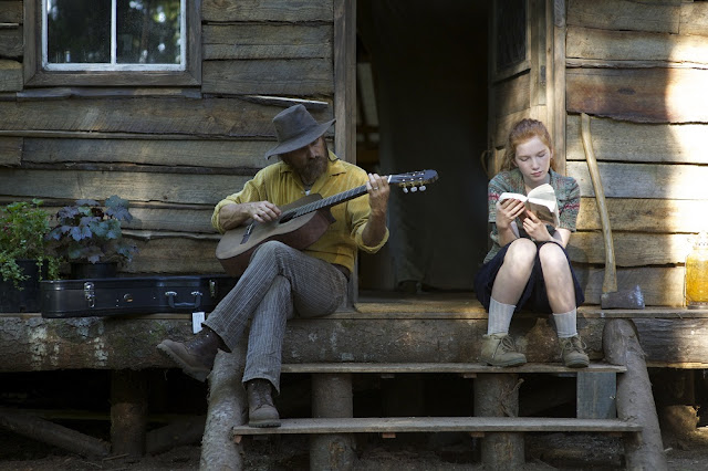 Ben's family at their cabin home in the forest. captain fantastic movie still