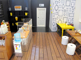 Modern dolls' house miniature cafe.