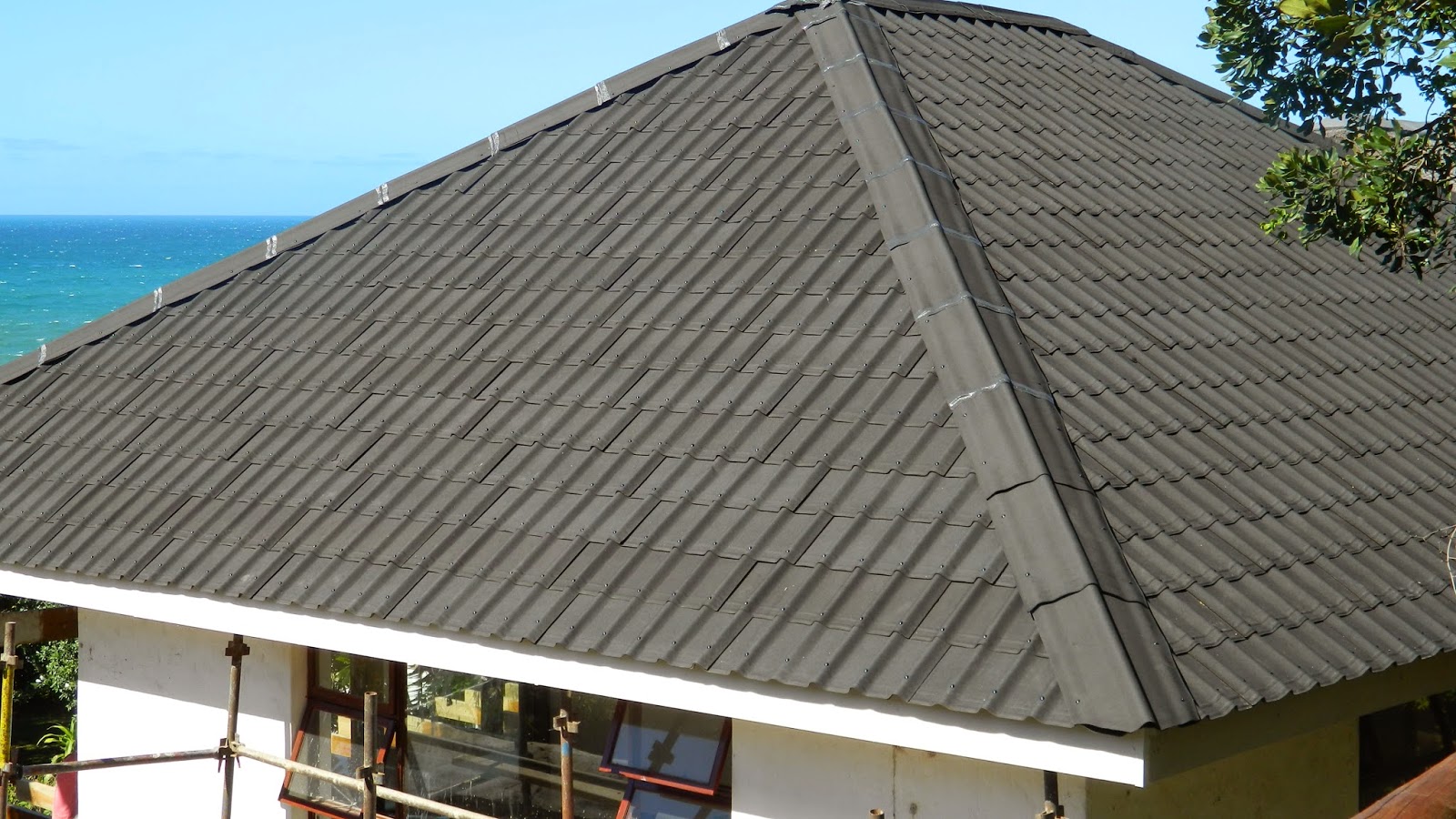 Change a Thatch Roof to Onduvilla Tiles