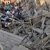 Four killed, dozens trapped as building collapses