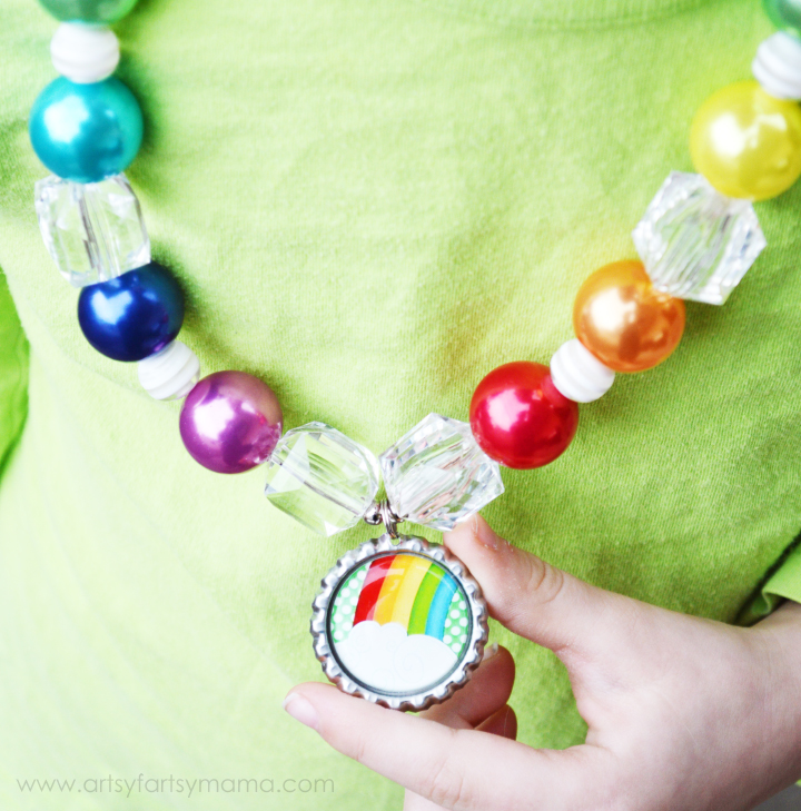 St. Patrick's Day Bottle Cap Necklace Tutorial at artsyfartsymama.com