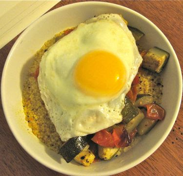 roasted sungold tomatoes and zucchini with couscous and fried egg