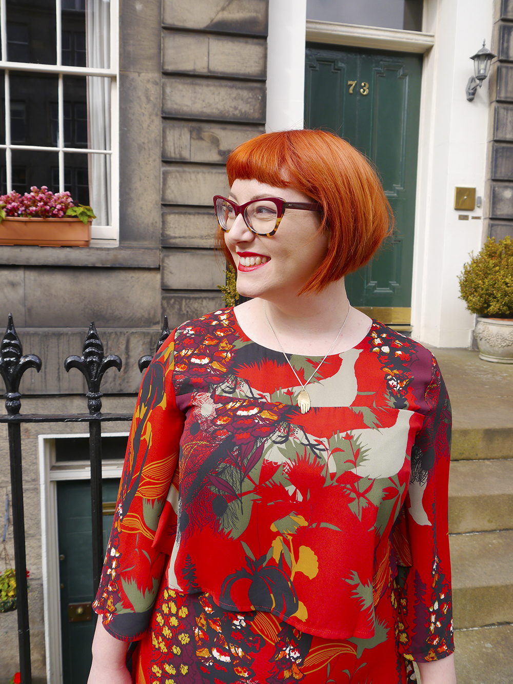 Pattern and colour - What to wear for Saturday Afternoon at Edinburgh Cocktail Weekend Red haired Scottish blogger Helen from Wardrobe Conversations wear a frill layered Biba dress