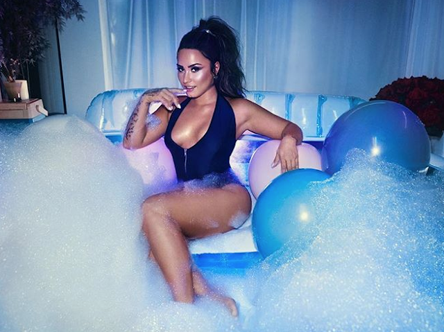 Demi Lovato seducing your eyes in Bathing Suit and sexy Ponytail