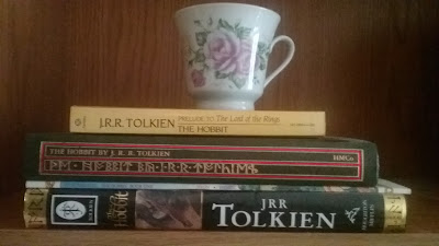 Happy 80th Birthday to The Hobbit by JRR Tolkien! Stack of Hobbit books and tea cup, Bea's Book Nook