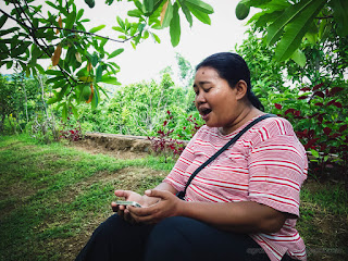 Woman Singing Follow The Song From Her Smartphone In The Beautiful Garden North Bali Indonesia
