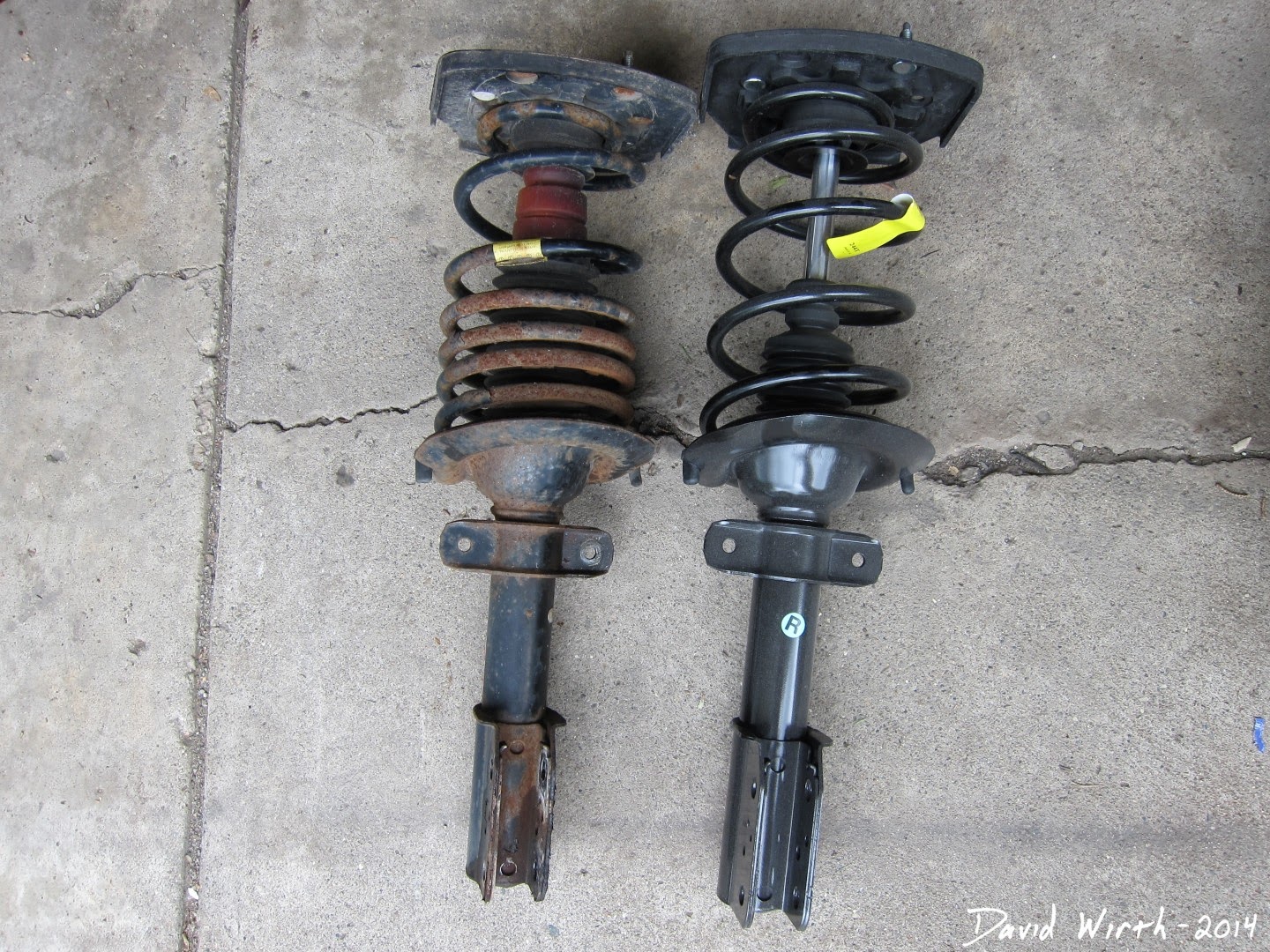 compare monroe struts, quick strut, shocks, old, new, rusted, collapsed