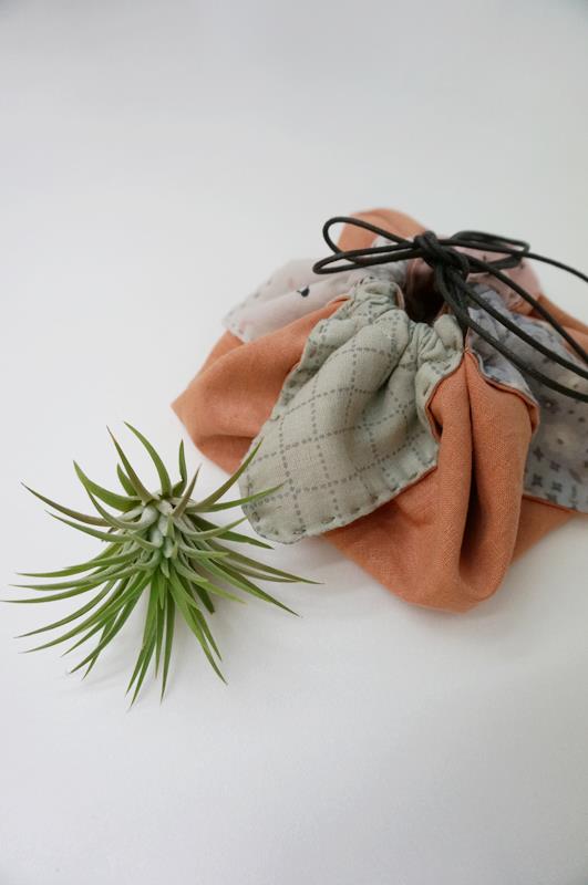 A petal bag (also known as an origami bag) is the easiest and quickest gift bag you'll ever make