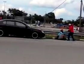 Polis Siasat Video Viral Suami Pukul Isteri Tepi Jalan