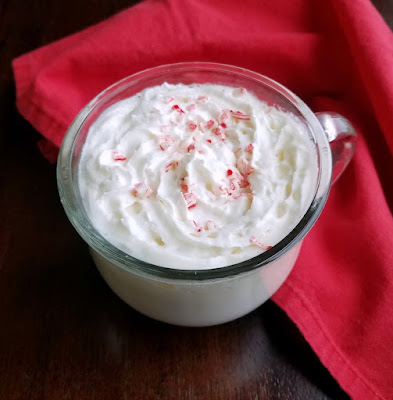 Warm up from the inside out when you take a sip of creamy smooth delicious comforting peppermint white hot chocolate. whip cream topped peppermint white hot chocolate