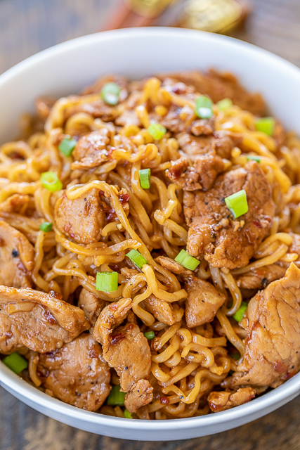 Spicy Pork Noodles - ready to eat in 10 minutes!!! Only 5 ingredients! Great weeknight meal!! Great way to use up leftover pork tenderloin. Pork tenderloin, brown sugar, soy sauce, chili garlic sauce, ramen noodles and green onions for garnish. Can add green beans or asparagus. We ate this twice in one week. Everyone LOVES this easy noodle bowl!! #pork #asian #ramen #noodles Spicy Pork Noodles - ready to eat in 10 minutes!!! Only 5 ingredients! Great weeknight meal!! Great way to use up leftover pork tenderloin. Pork tenderloin, brown sugar, soy sauce, chili garlic sauce, ramen noodles and green onions for garnish. Can add green beans or asparagus. We ate this twice in one week. Everyone LOVES this easy noodle bowl!! #pork #asian #ramen #noodles