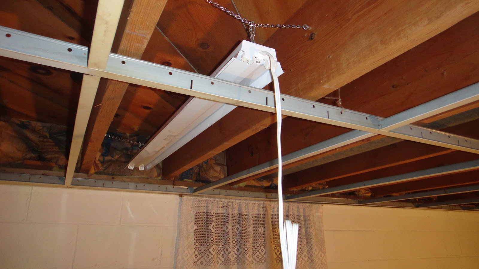 The Tinkers And The Shop Lights Were Hung From The Joists