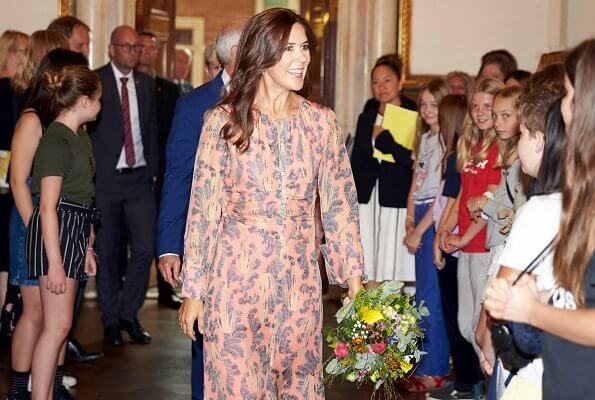 Crown Princess Mary wore a H&M silk dress and a Gianvito Rossi python pointed toe pumps