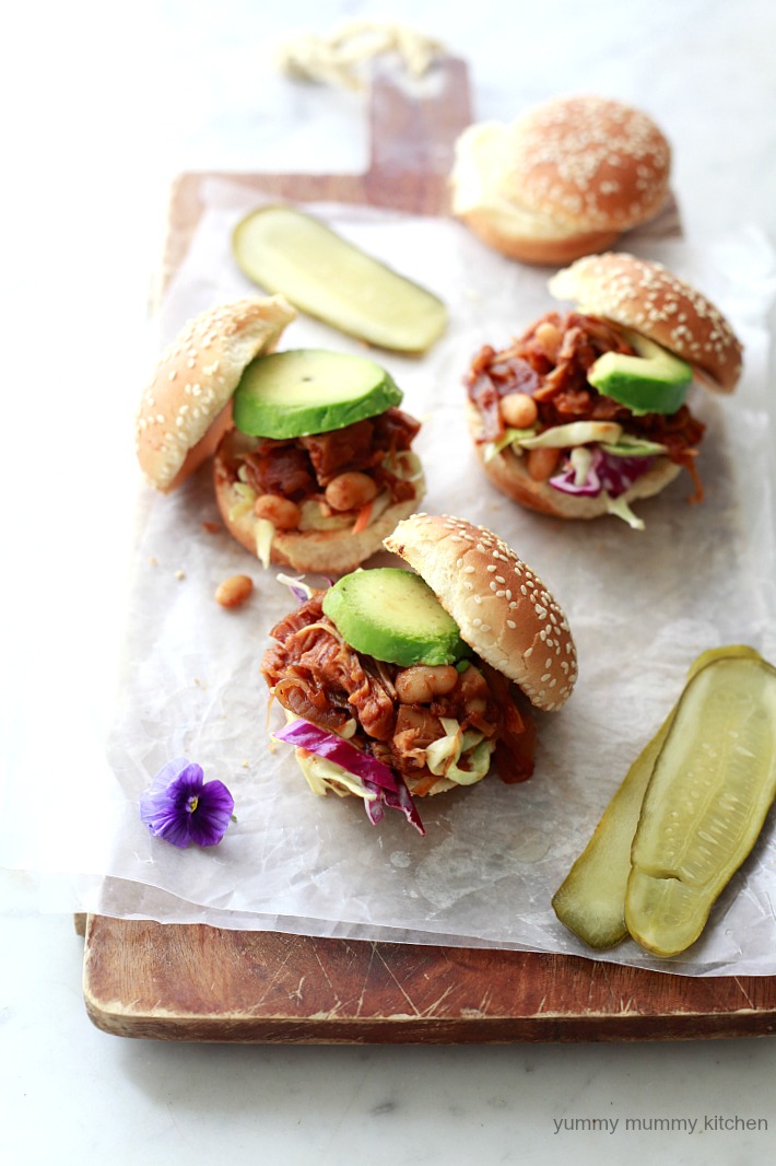 Slow Cooker Vegan Pulled Jackfruit Sandwiches Easy BBQ pulled jackfruit and bean sandwiches made in the slow cooker or crockpot and served with slaw and avocado. These delicious jackfruit sandwiches are vegetarian and vegan.