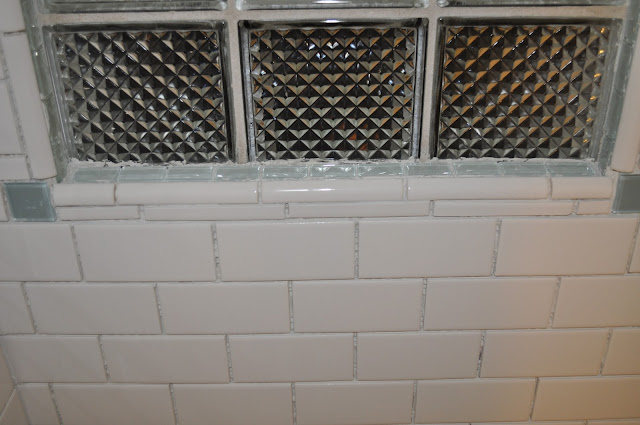 bathroom, reno, subway tile, sea glass tile, glass tile, white grout, grout, glass block window, 