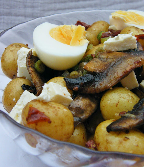 Hearty Potato, Egg & Feta Salad in a glass bowl