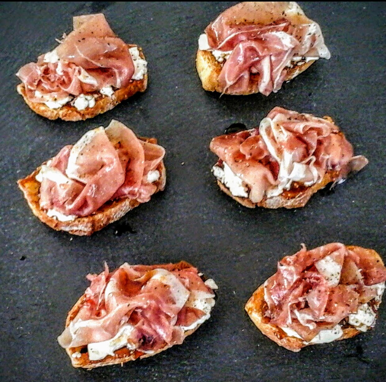 GoatCheeseandProsciutto Crostini with Honey and Fig Jam