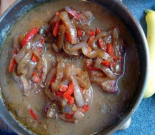 Pork Chops in Gravy covered with Onions and Peppers