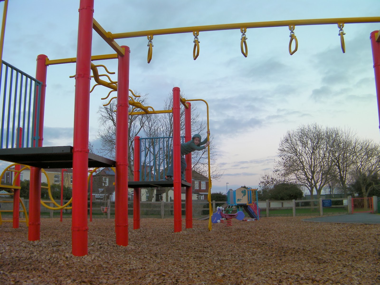 climbing frame yellow monkey bars and rings teignmouth road play park recreation ground baffins portsmouth