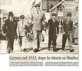 Primo Carnera, who stood 6ft 6ins tall, towered above the average man of his day, as this news cutting shows
