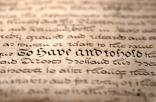 Photograph of old writing highlighting the words "to have and to hold"