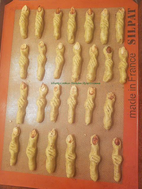 Halloween Pistachio Witches Finger Cookies Halloween Pistachio Witches Finger Cookies scary crooked pistachio cookies buttery pistachio green tasty cookies for a ghoulish Halloween trick or treat