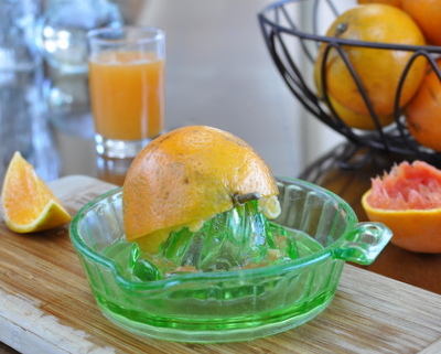Juicing oranges for fresh orange juice ♥ KitchenParade.com