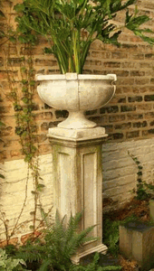 A Rustic Garden: Using An Urn Planter Pedestal in Your Decor