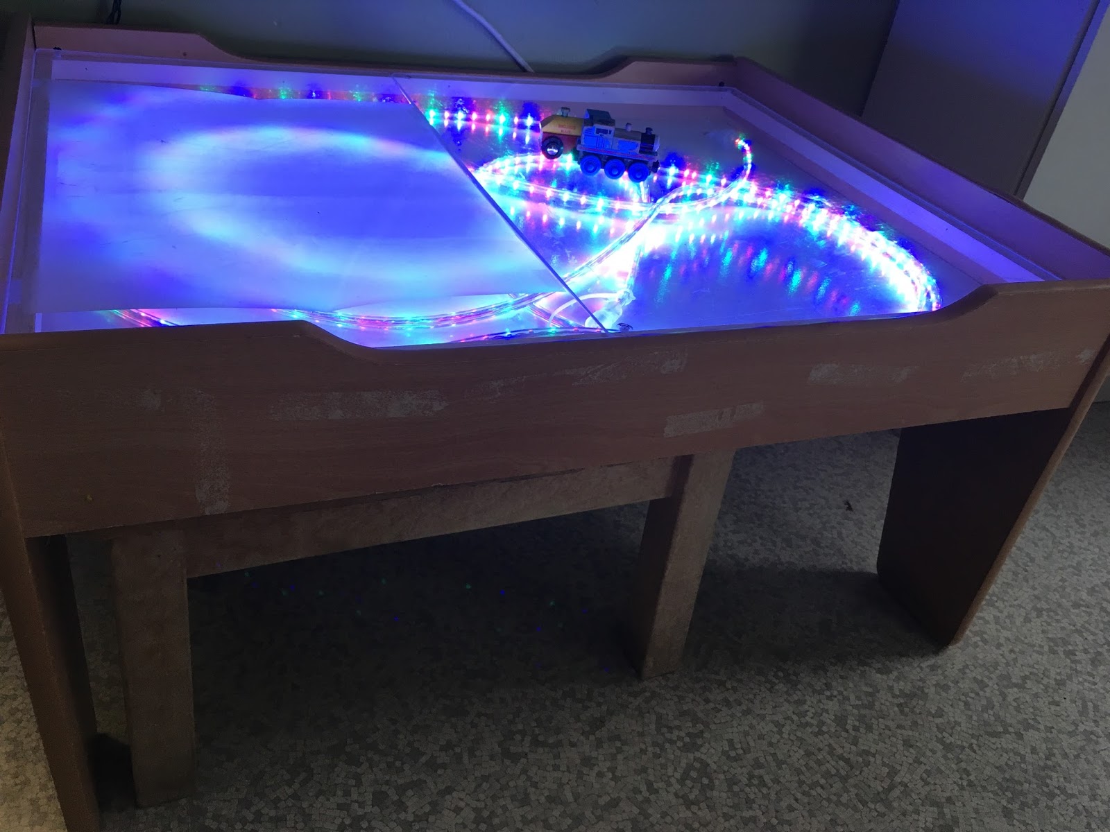 DIY Light Table for Infants and Toddlers. and the carrot came up
