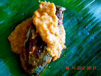 banana leaf wrapped fish in sauce