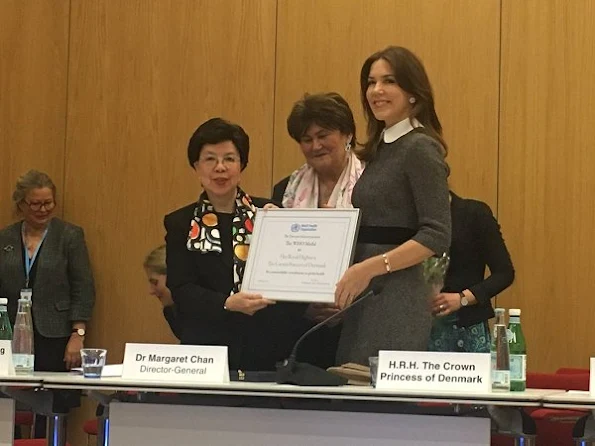 Crown Princess Mary received the WHO Award 2017 from WHO Director-General, Dr. Margaret Chan. Princess wore Prada dress