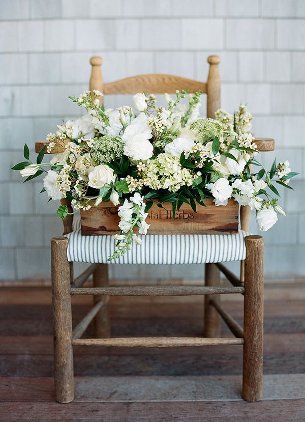 A Wooden Crate Full Of Blooming Flowers Looks Beautiful Displayed On Vintage Chair Perfect For Any Cottage Porch From Sweet Tea And Mimosas A Wooden Crate Full Of Blooming Flowers Looks Beautiful Displayed On Vintage Chair Perfect For Any Cottage Porch From Sweet Tea And Mimosas