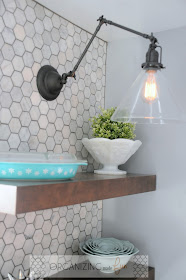 Bronze swing-arm sconce with clear glass shade and edison bulb :: OrganizingMadeFun.com