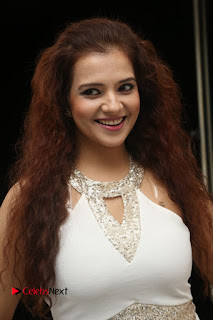 Actress Saloni Stills in White Short Dress at Meelo Evaru Koteeswarudu Movie Audio Launch  0014