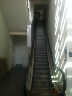 library lobby with escalator