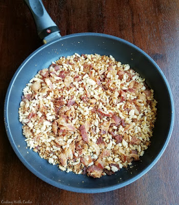 swiss diamond skillet with bacon and bread crumbs in it