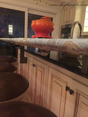 Underneath of the bar with the fitted tablecloth on it. Underneath of the bar with the fitted tablecloth on it.