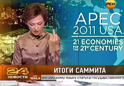 From Russia without love! Newsreader makes one-finger gesture to camera when she mentions Obama's name 1