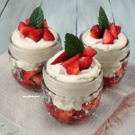 Strawberry And Marshmallow Mousse Rosewater infused Strawberries topped with a Liqueur based Marshmallow topping, all in a jar ~ simple, but this Summer's most decadent dessert !