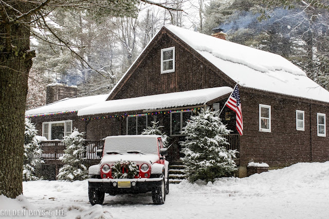 Christmas cabin in the mountains with jeep